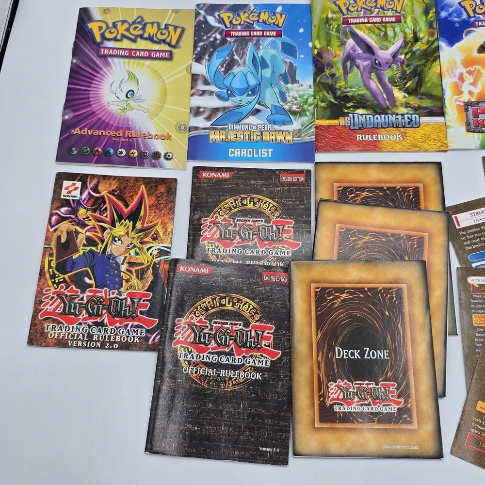 Lot Of Pokémon‎ And Yu-gi-oh RuleBooks Card Lists Deck Zones